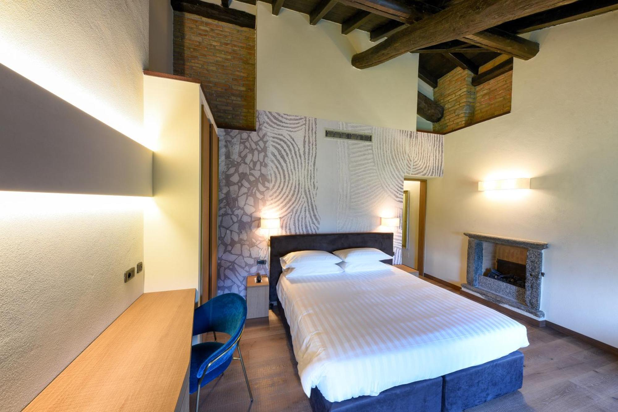 Relais & Spa Castello Di Casiglio Erba Szoba fotó